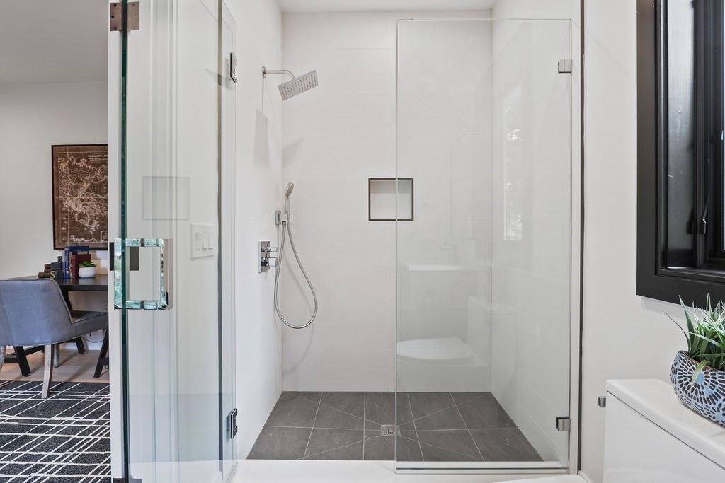 108 Bradford Street Needham, MA 02492 - Photo 18 of 42 a bathroom with a glass shower door