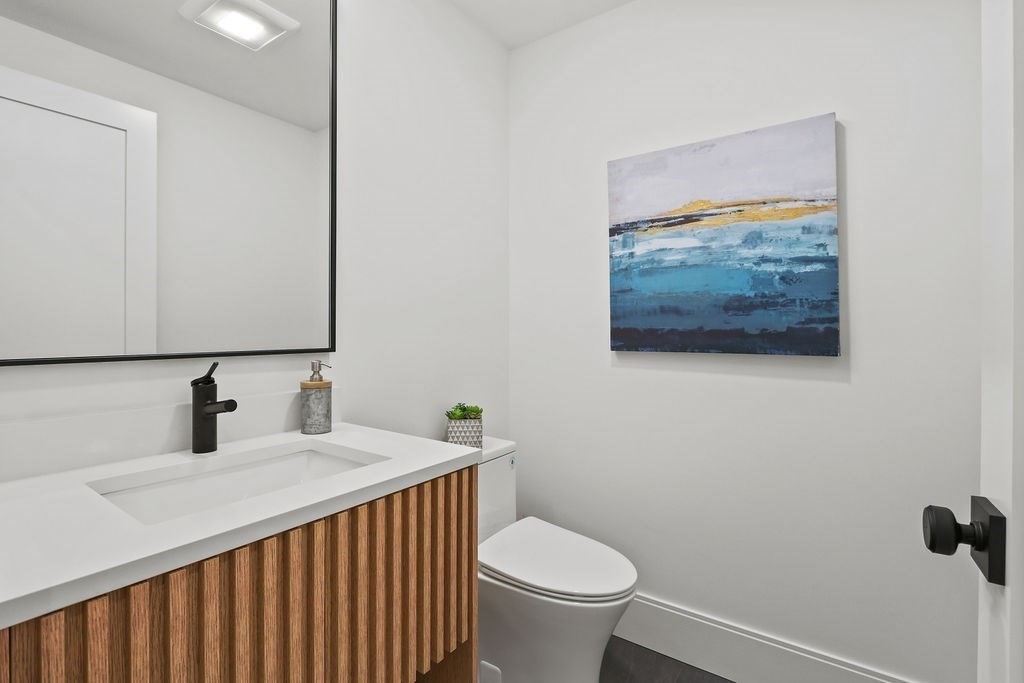 108 Bradford Street Needham, MA 02492 - Photo 20 of 42 a bathroom with a sink and a toilet