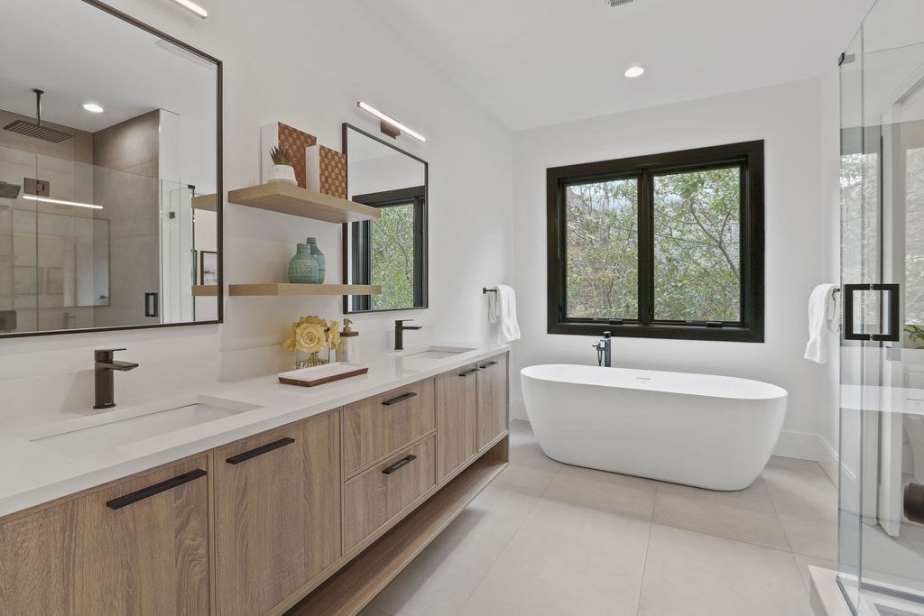 108 Bradford Street Needham, MA 02492 - Photo 24 of 42 a bathroom with a double vanity sink tub mirror and window