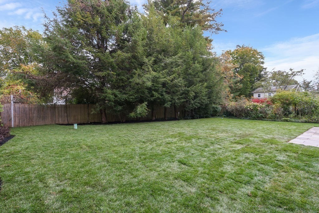 108 Bradford Street Needham, MA 02492 - Photo 41 of 42 a view of a backyard with a trees