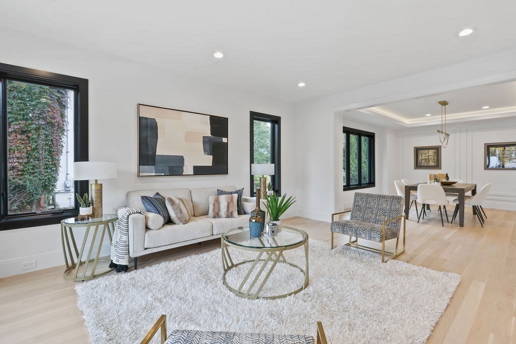 108 Bradford Street Needham, MA 02492 - Photo 5 of 42 a living room with furniture and a large window