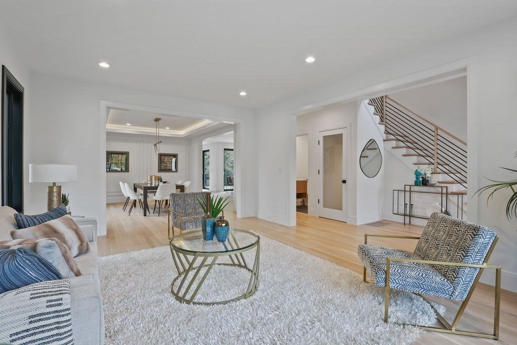 108 Bradford Street Needham, MA 02492 - Photo 7 of 42 a living room with furniture and a table