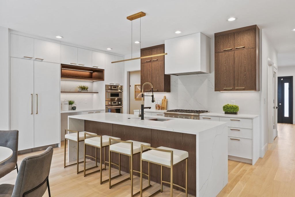 108 Bradford Street Needham, MA 02492 - Photo 10 of 42 a kitchen with a sink cabinets and window
