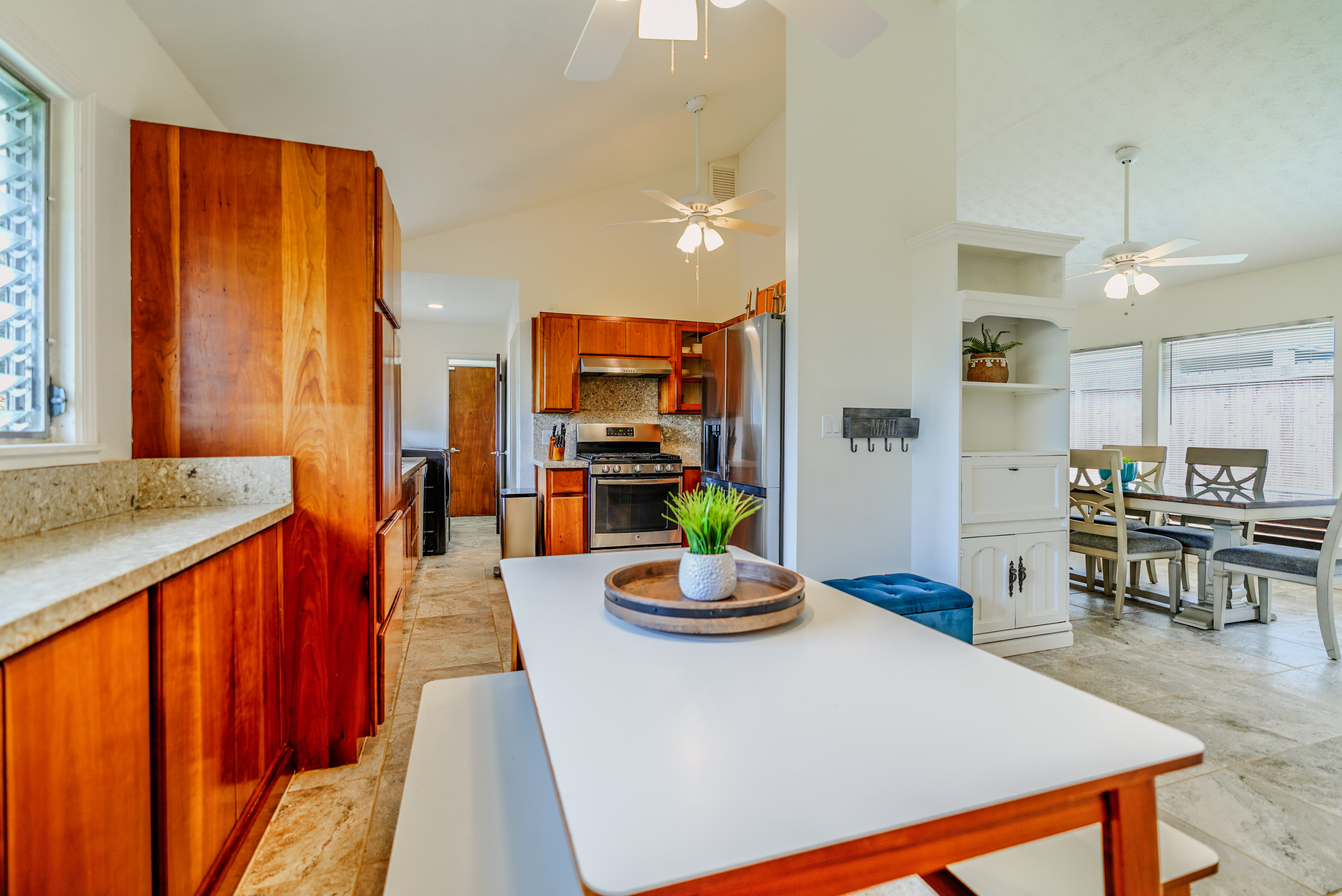 316 A Makani Road, Unit A Kapaa, HI 96746 - Photo 10 of 29 a living room with dining table and chairs