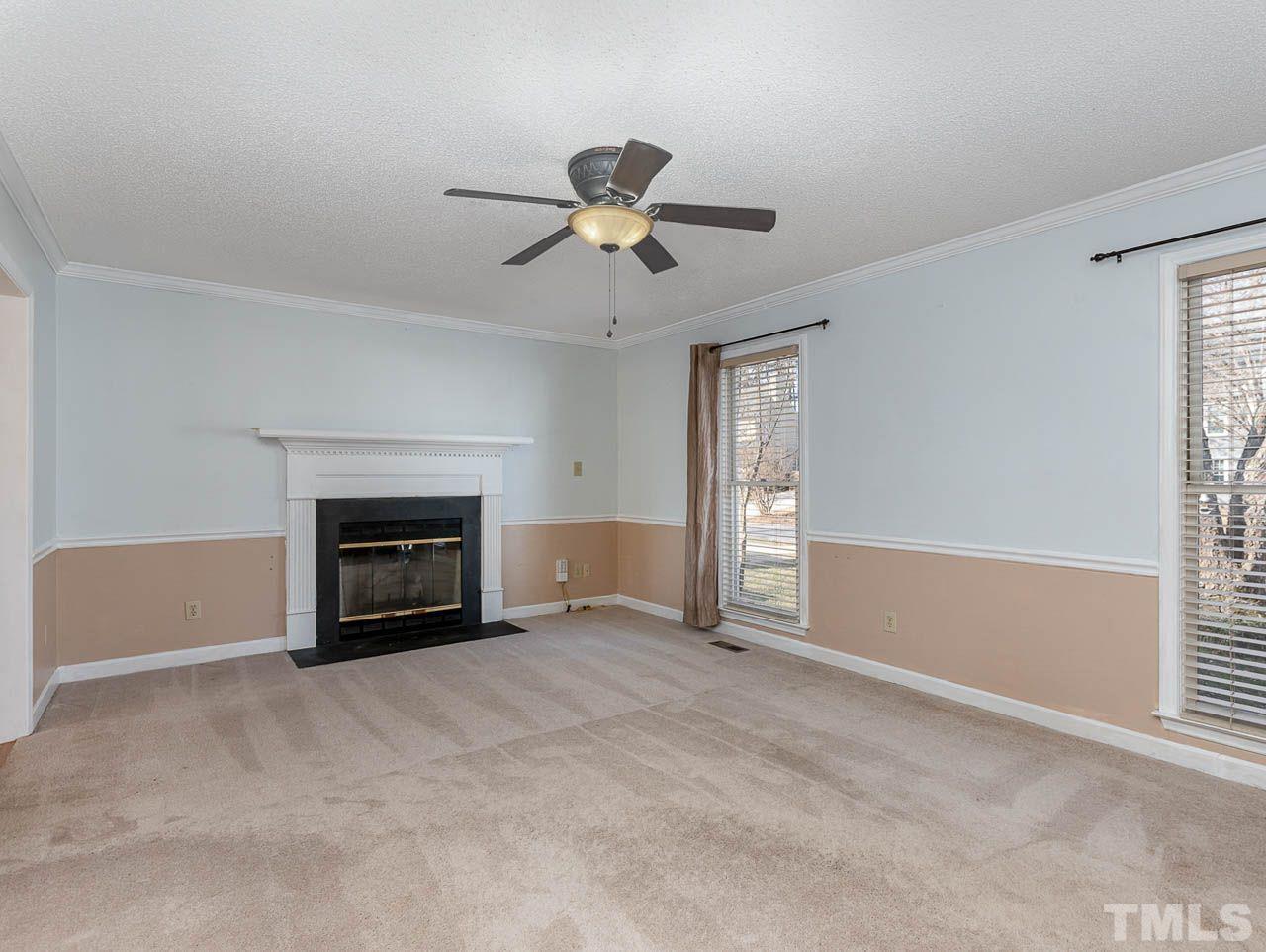 2512 Holbrook Court Raleigh, NC 27604 - Photo 11 of 26 a view of empty room with fan and window