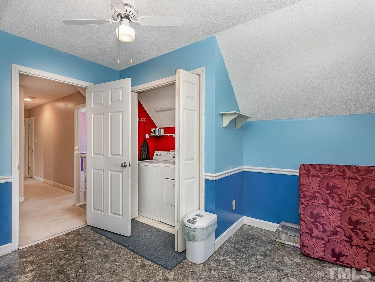 2512 Holbrook Court Raleigh, NC 27604 - Photo 20 of 26 a living room with furniture