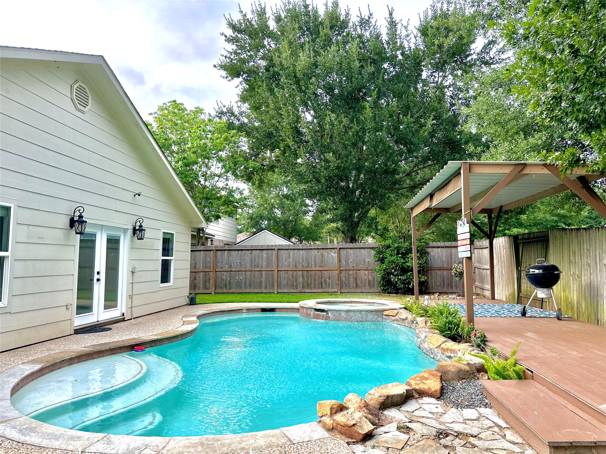 24914 Aughton Court Spring, TX 77389 - Photo 14 of 27 Private pool with a detached covered patio for outdoor entertaining.