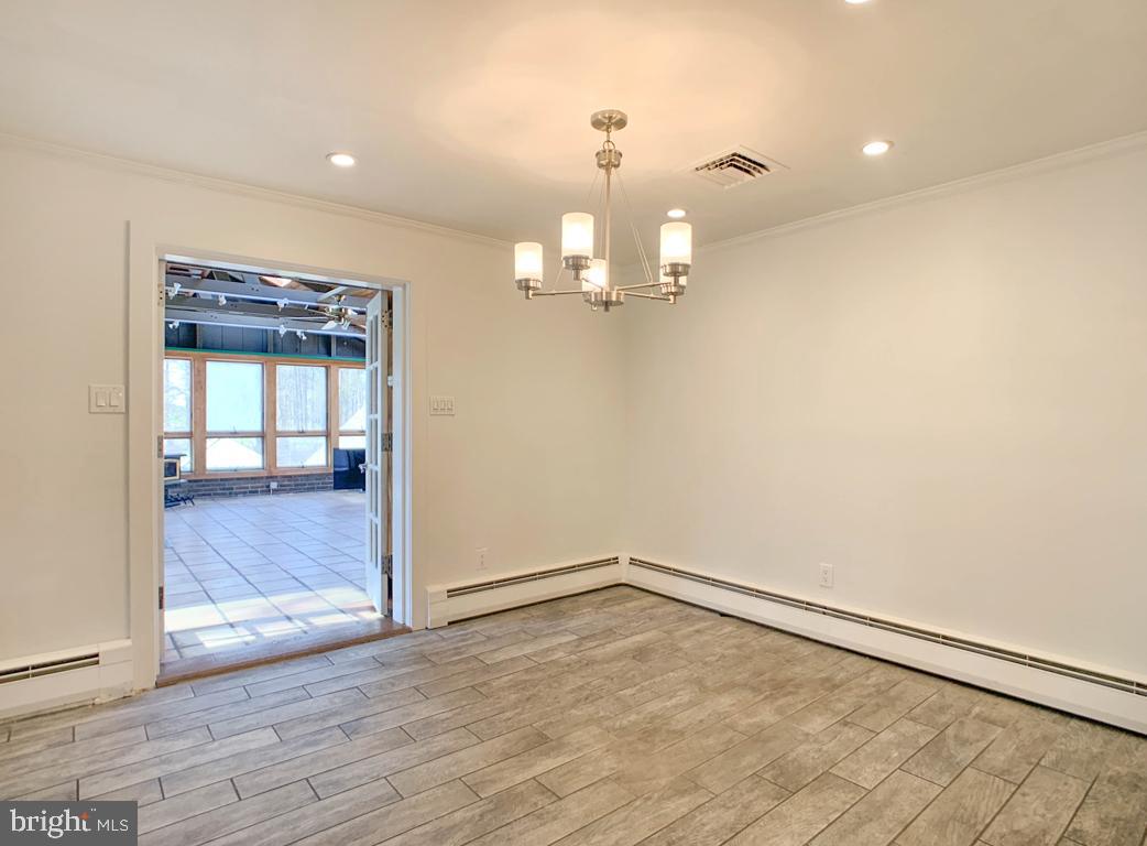 302 Brae Bourn Road Huntingdon Valley, PA 19006 - Photo 19 of 63 Dining Area leading to Sunroom