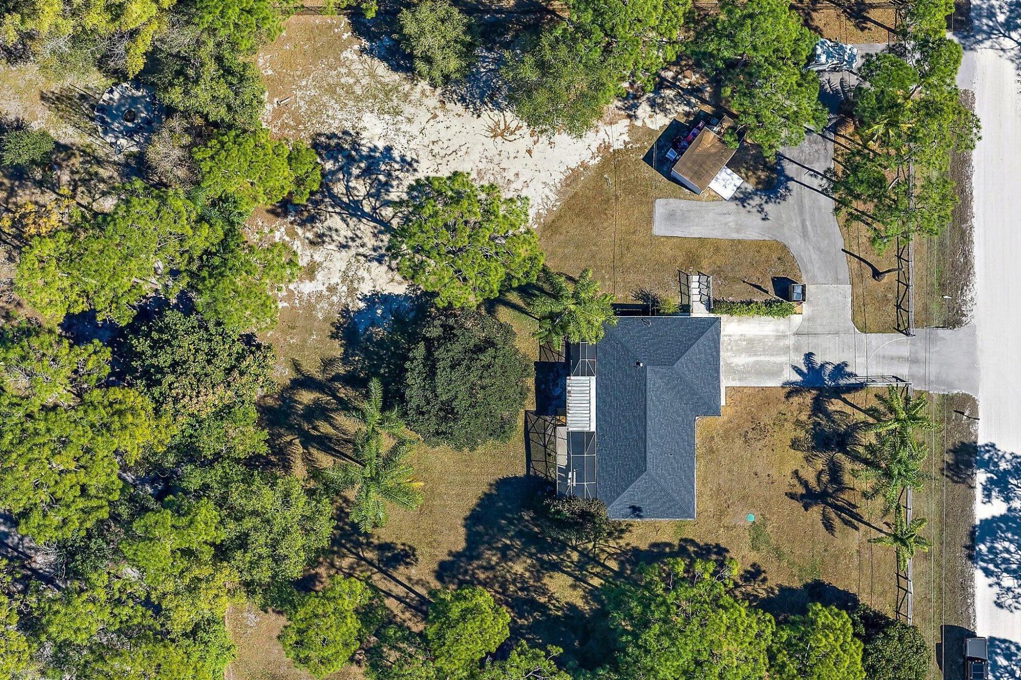 18389 41st Road North Loxahatchee, FL 33470 - Photo 33 of 33 an aerial view of a house with a yard