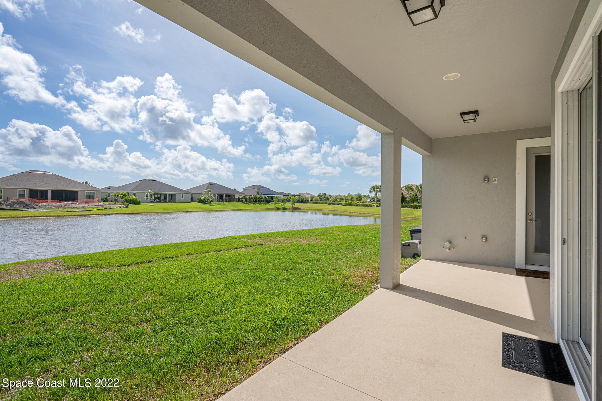 7739 Kerrington Drive Melbourne, FL 32940 - Photo 21 of 35 a view of a big room with an ocean view