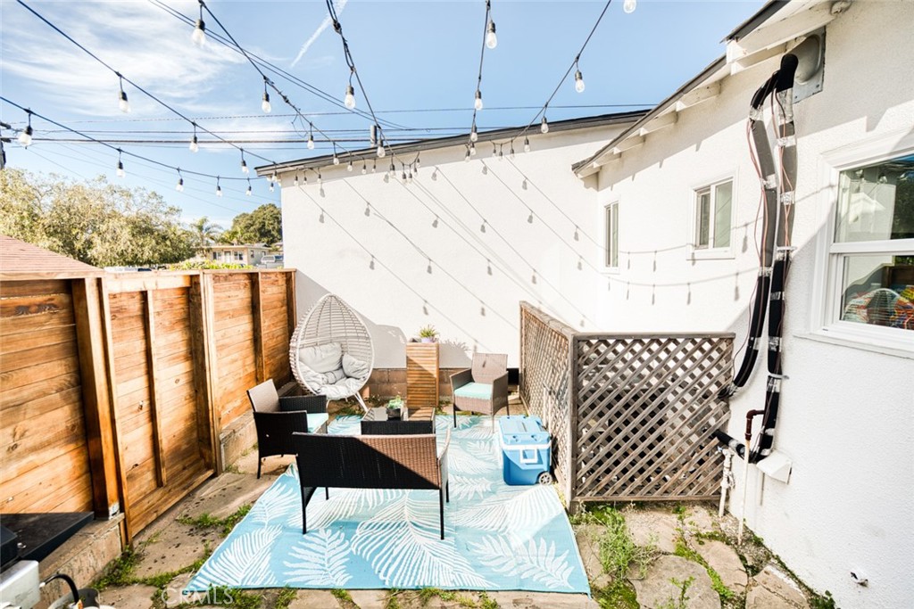261 North 13th Street Grover Beach, CA 93433 - Photo 25 of 46 a view of a chairs and table in patio