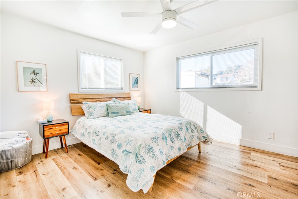 261 North 13th Street Grover Beach, CA 93433 - Photo 37 of 46 a bedroom with a bed and a window