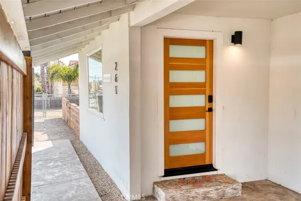 a view of entry way with wooden floor