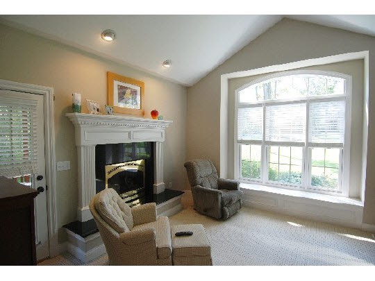 12737 Ashfield Road Caledonia, IL 61011 - Photo 4 of 11 a living room with furniture and a fireplace