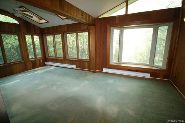 an empty room with a large window