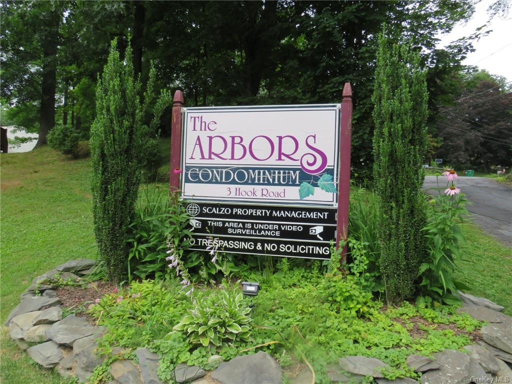 a sign on the side of the road