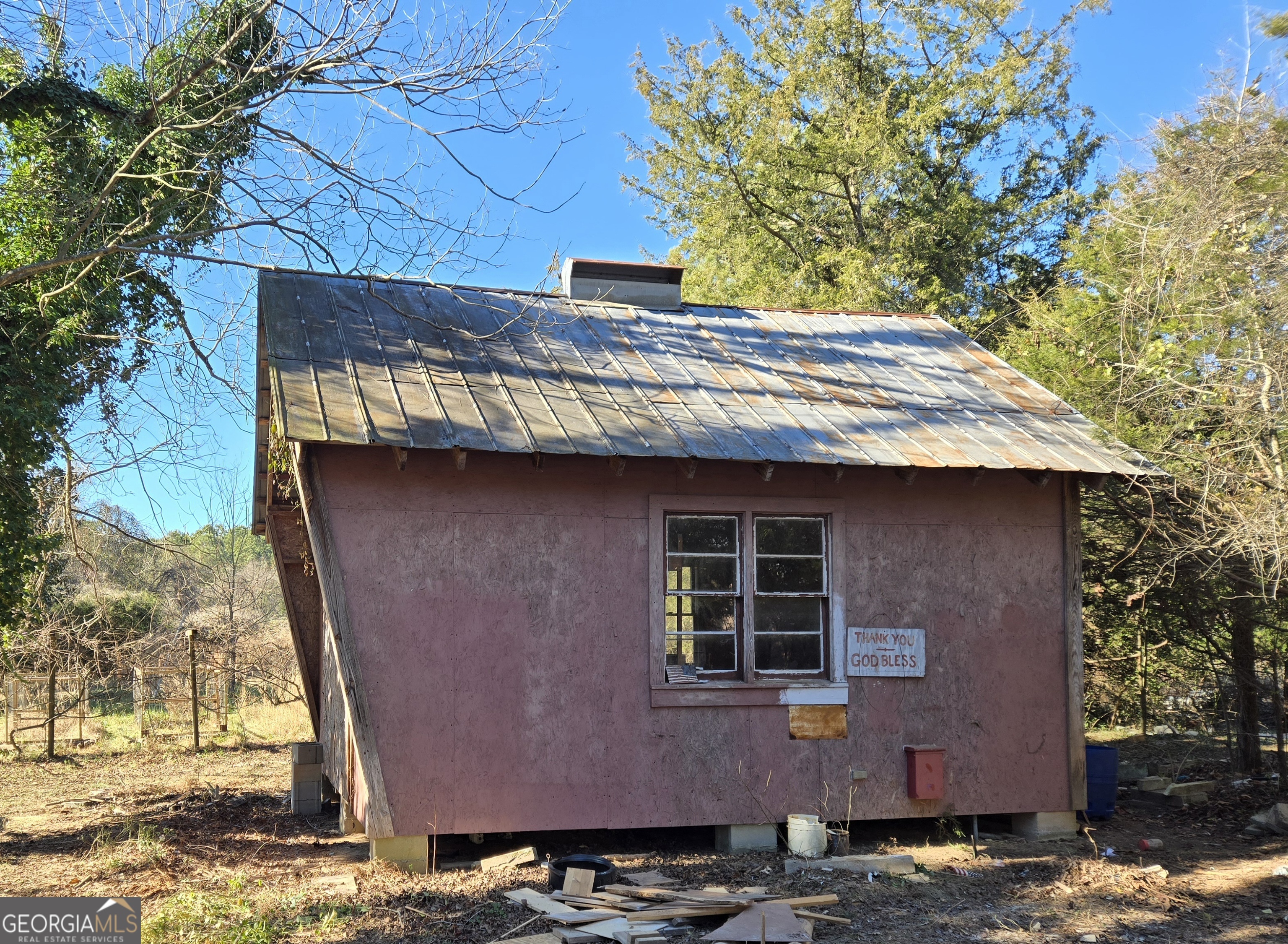 646 Walters Road Lavonia, GA 30553 - Photo 3 of 14 a front view of a house with a yard