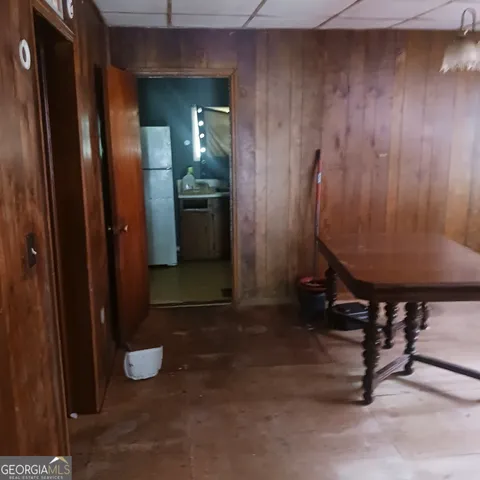 a living room with furniture and a gate