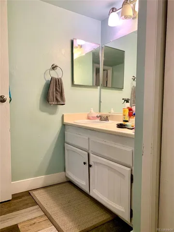 a room with gym equipment and windows