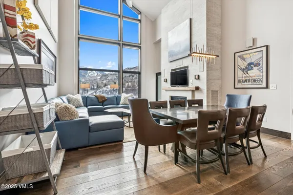a view of a dining room with furniture window and outside view