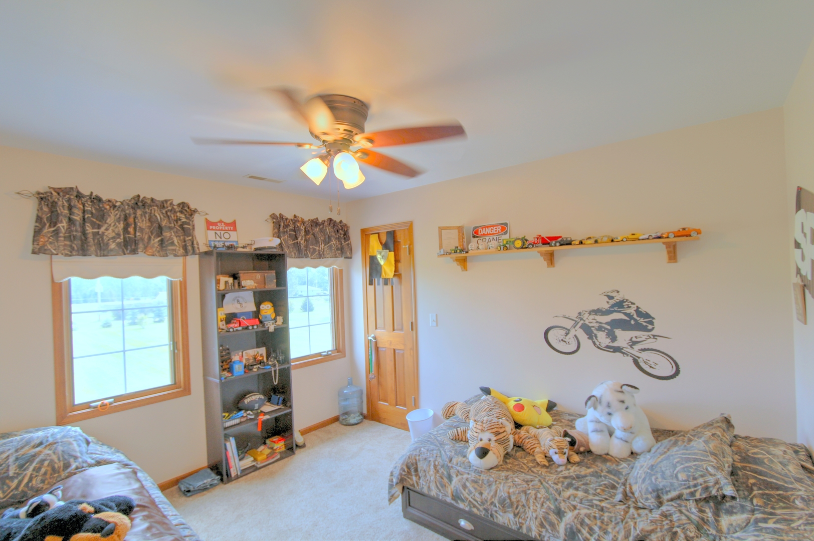 2803 East 2575th Road Marseilles, IL 61341 - Photo 11 of 30 a bedroom with a bed and a chandelier
