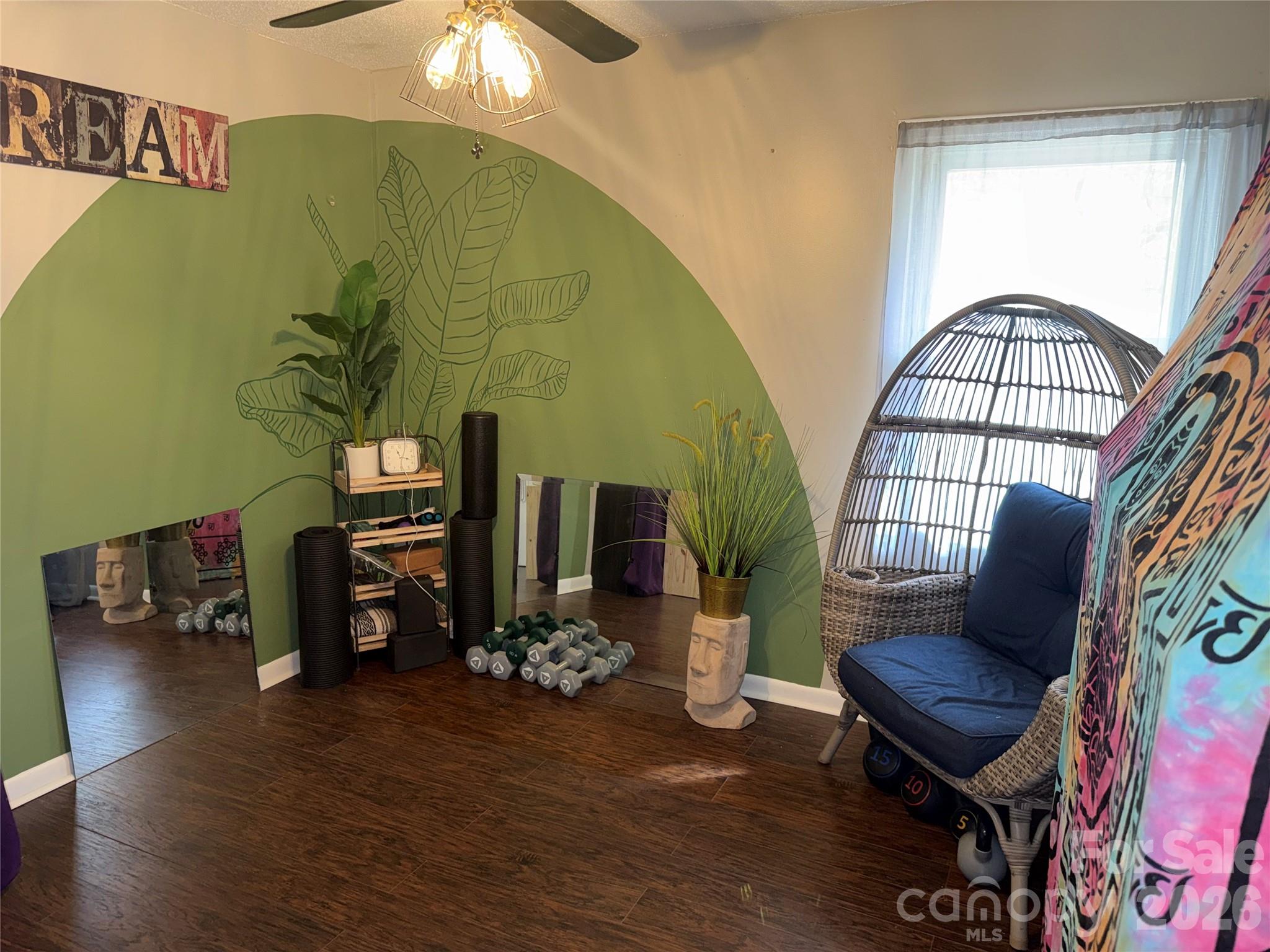 1304 Seaton Road, Unit 15 Durham, NC 27713 - Photo 16 of 20 a living room with furniture a fireplace and a flat screen tv