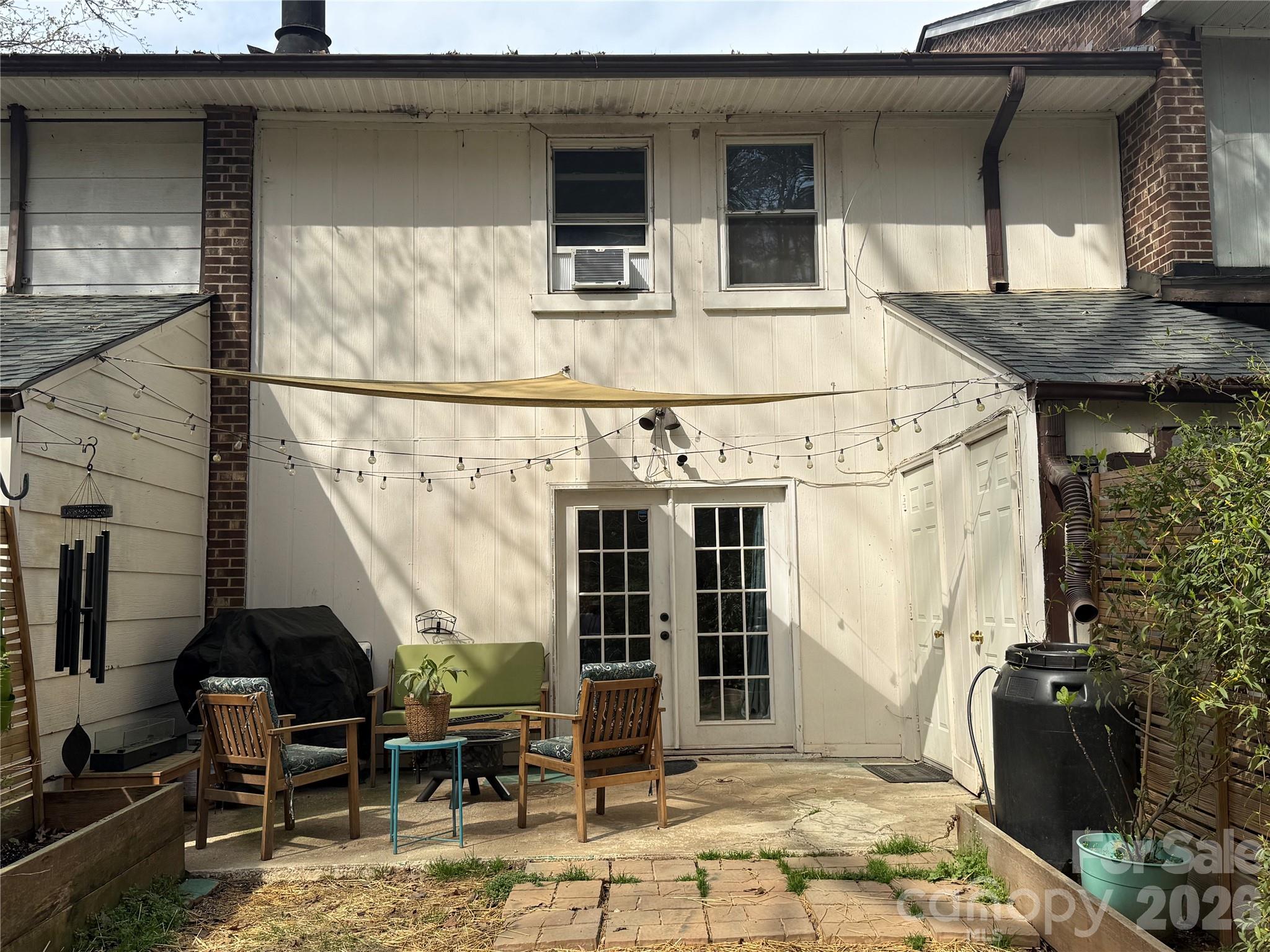 1304 Seaton Road, Unit 15 Durham, NC 27713 - Photo 20 of 20 a view of a house with a window and sitting area