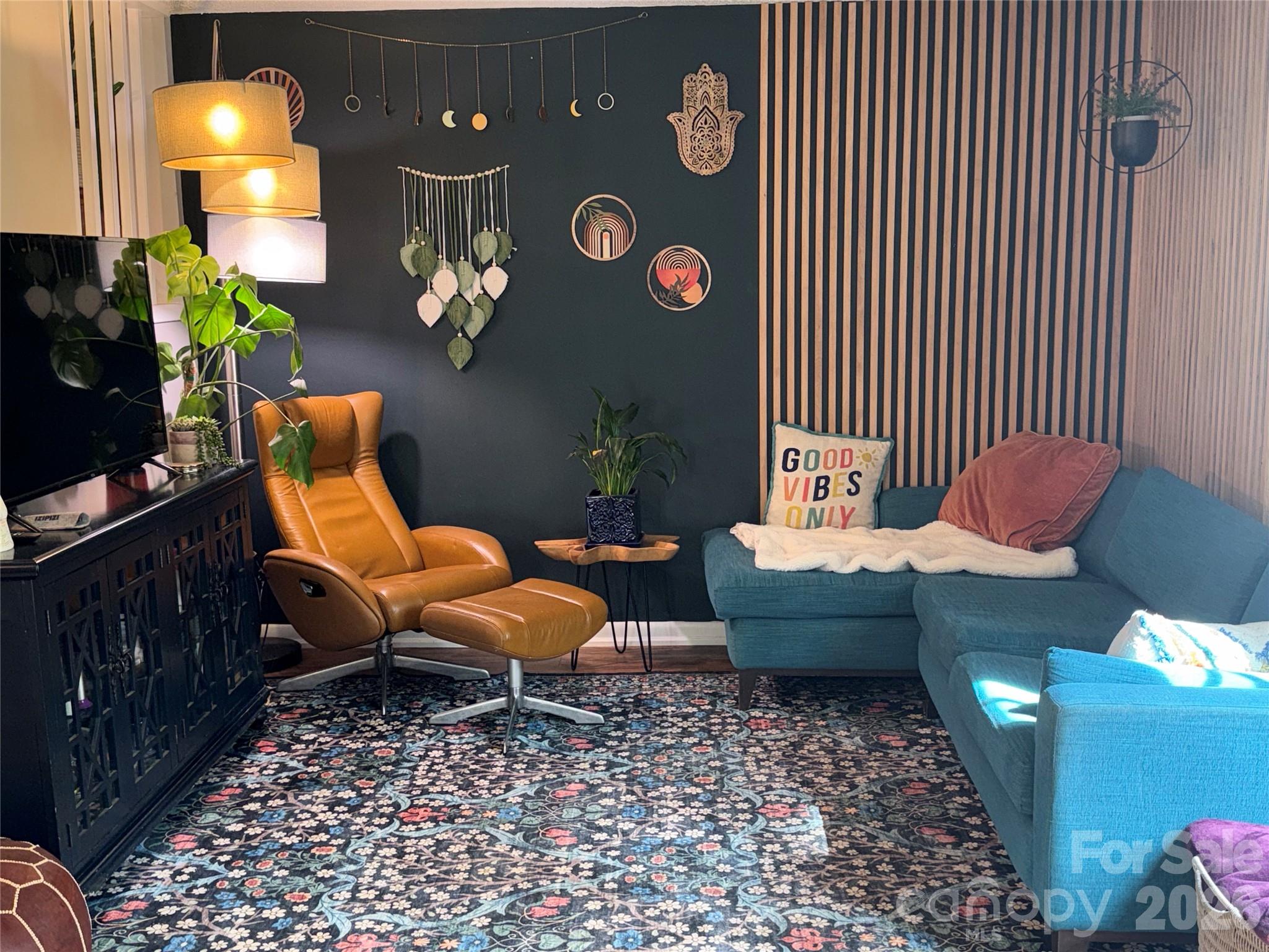 1304 Seaton Road, Unit 15 Durham, NC 27713 - Photo 3 of 20 a living room with furniture and a lamp