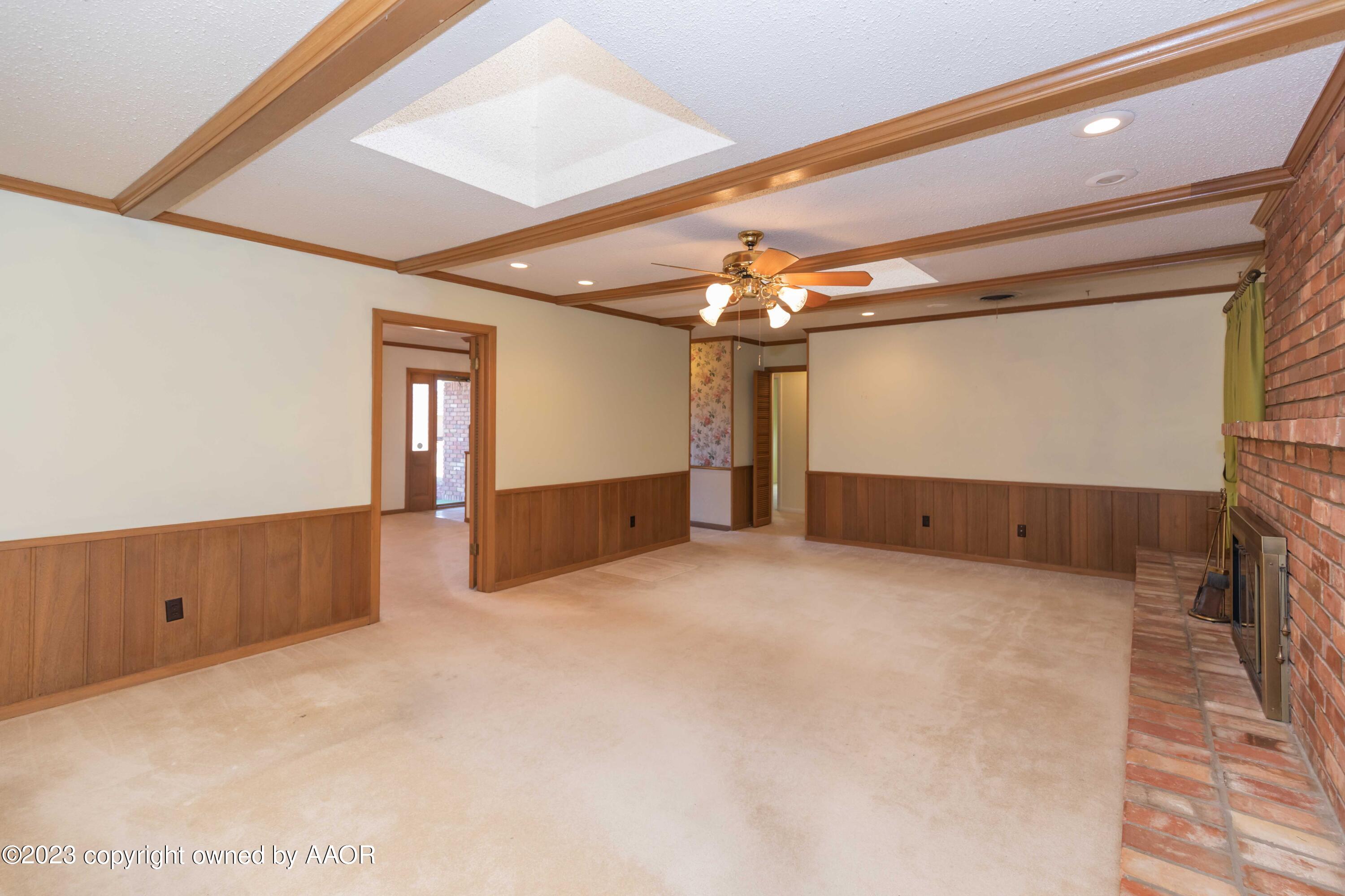 6403 Dreyfuss Road Amarillo, TX 79106 - Photo 8 of 46 a view of a livingroom with hardwood and furniture