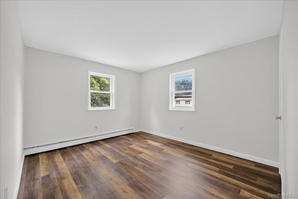 226 Knoth Road Wallkill, NY 12589 - Photo 23 of 34 a view of a room with wooden floor and window