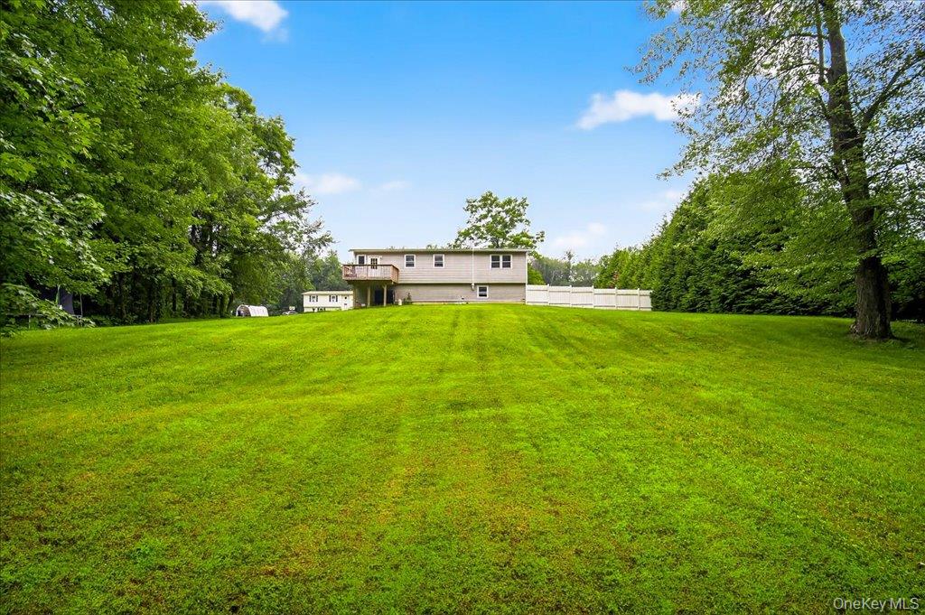 226 Knoth Road Wallkill, NY 12589 - Photo 31 of 34 a view of a garden with a building in the background