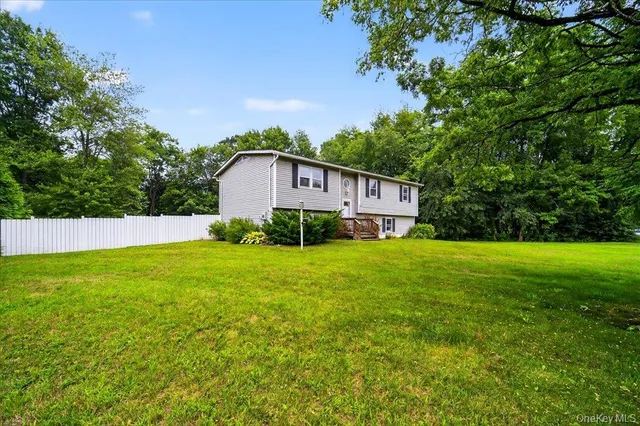 a house view with a garden space