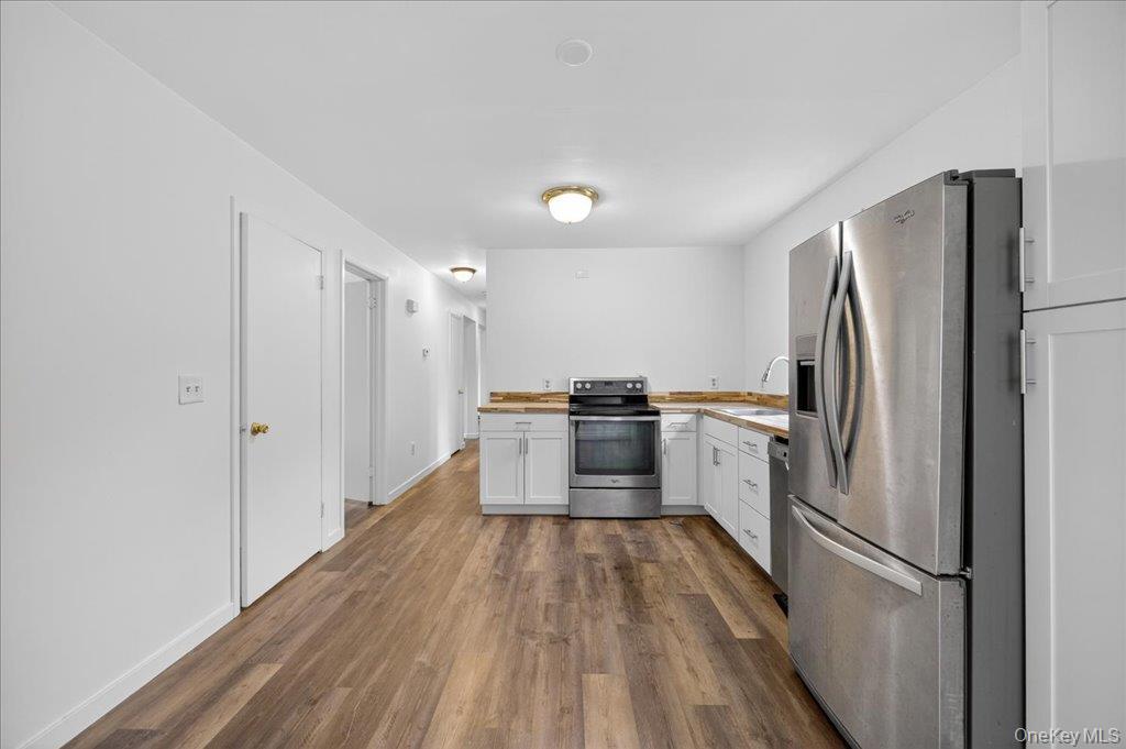 226 Knoth Road Wallkill, NY 12589 - Photo 10 of 34 a kitchen with a refrigerator a sink and dishwasher