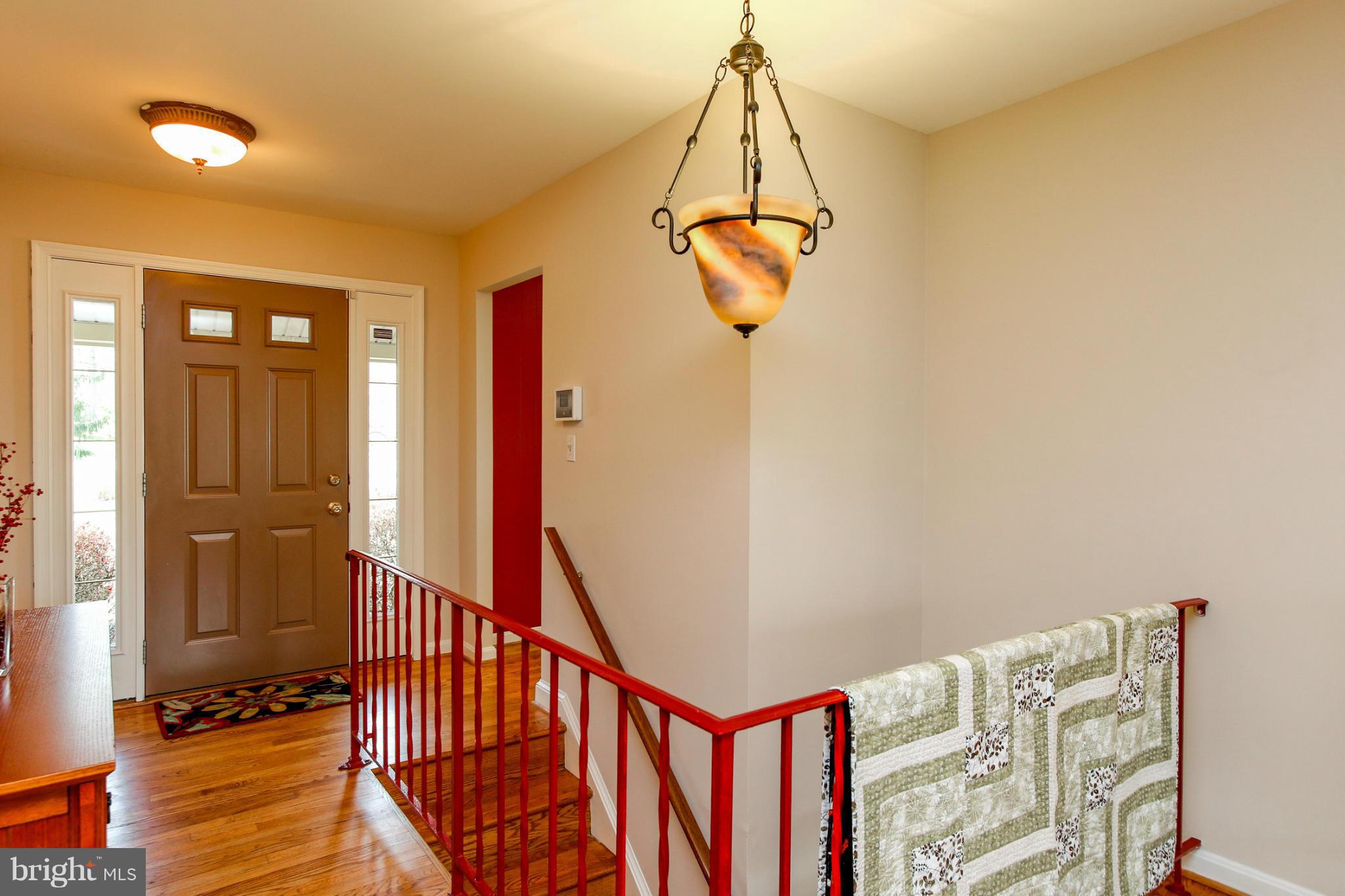 13201 Clifton Road Silver Spring, MD 20904 - Photo 2 of 30 a view of entryway with wooden floor