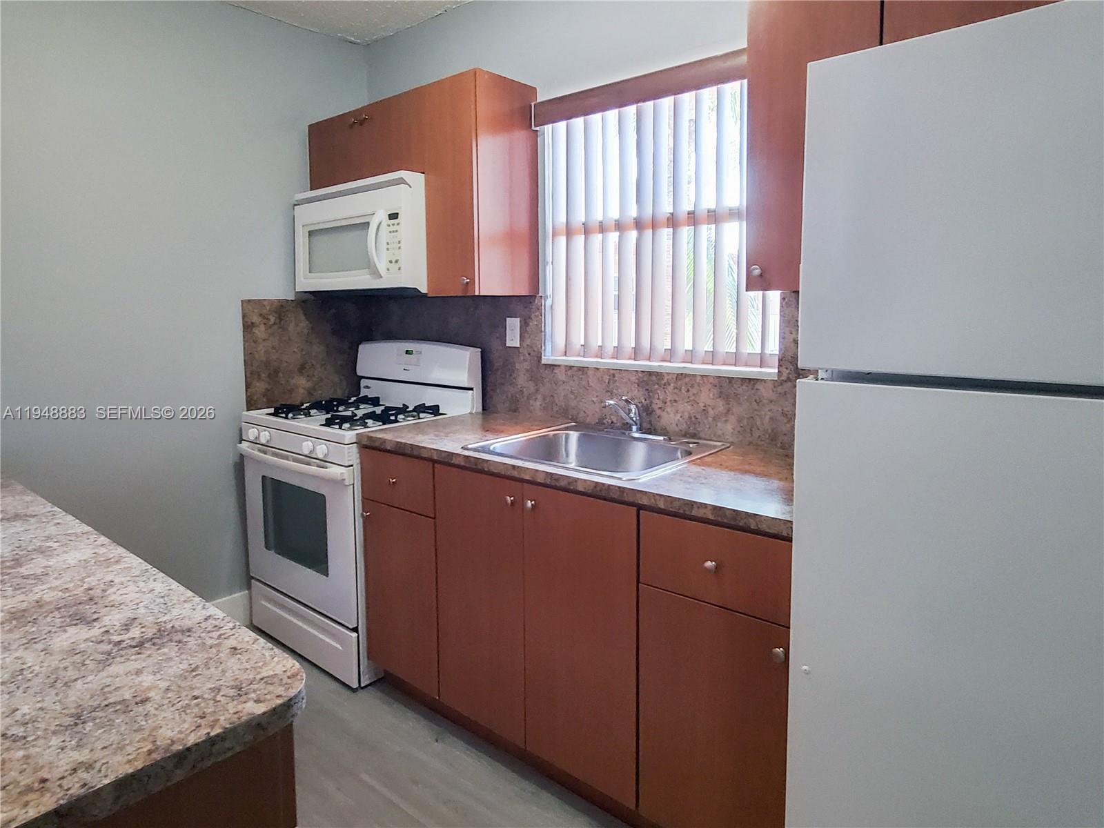 1265 West 24th Street, Unit 212 Hialeah, FL 33010 - Photo 1 of 14