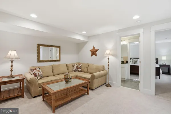 a living room with furniture and a table