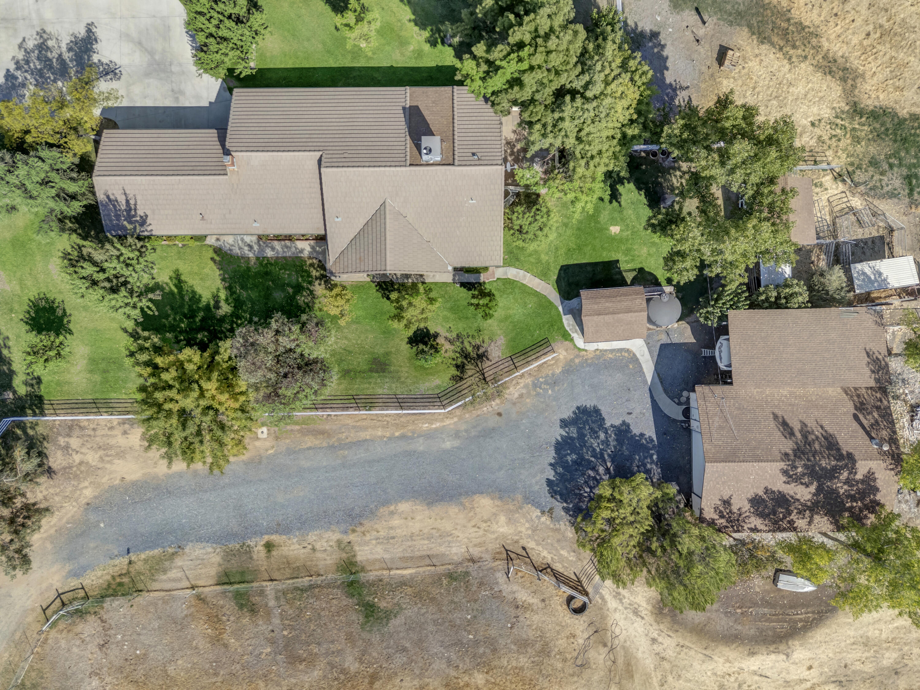 18002 320th Road Springville, CA 93265 - Photo 14 of 56 an aerial view of a house with a yard and trees