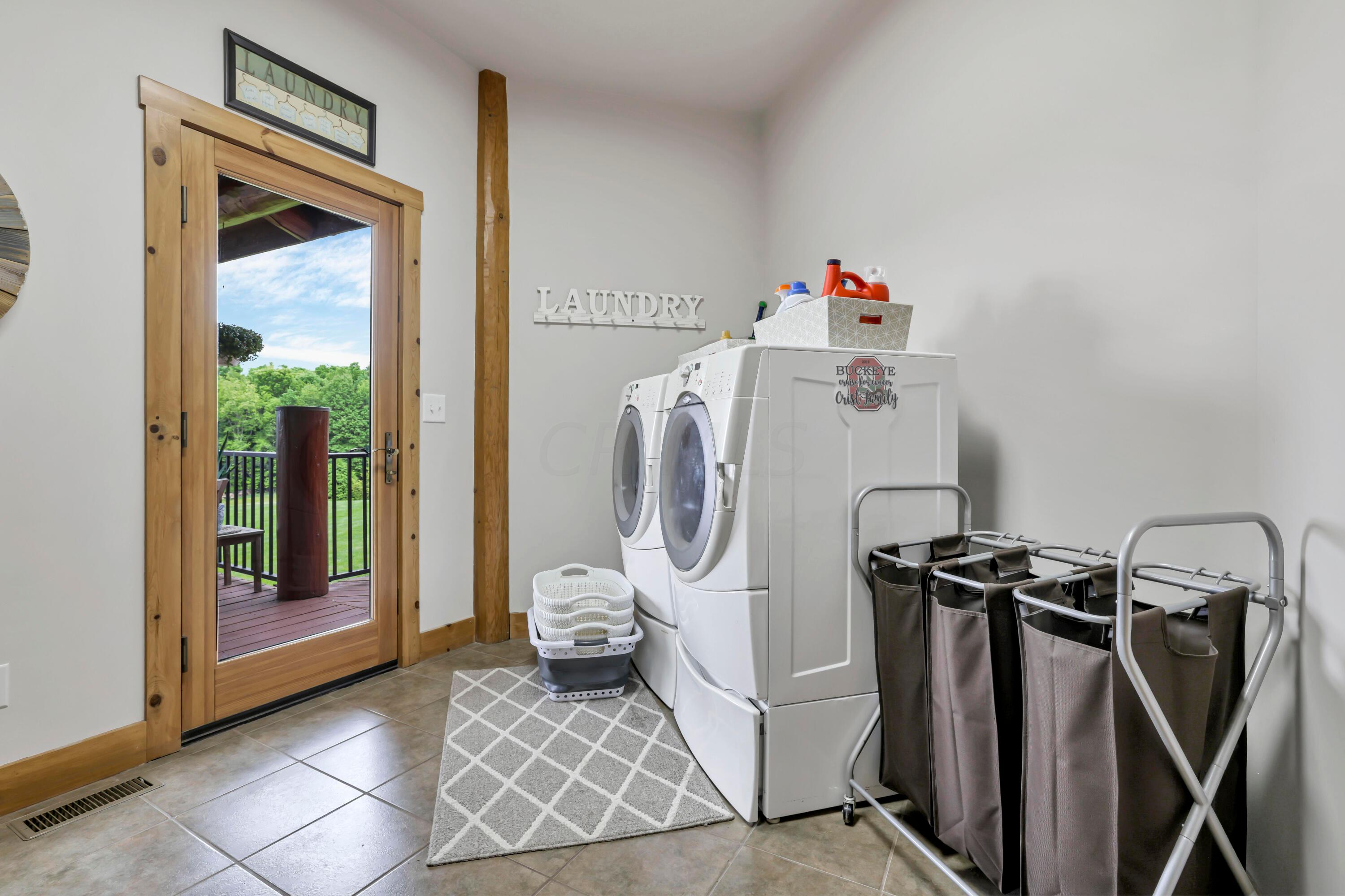 10985 Clearport Road Southwest Amanda, OH 43102 - Photo 57 of 126 1st floor laundry w/ deck access