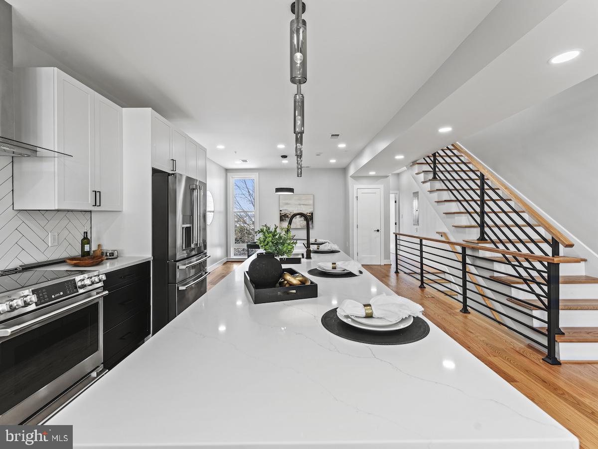 4318 7th Street Northwest, Unit 2 Washington, DC 20011 - Photo 15 of 33 Sleek kitchen with modern elegance.