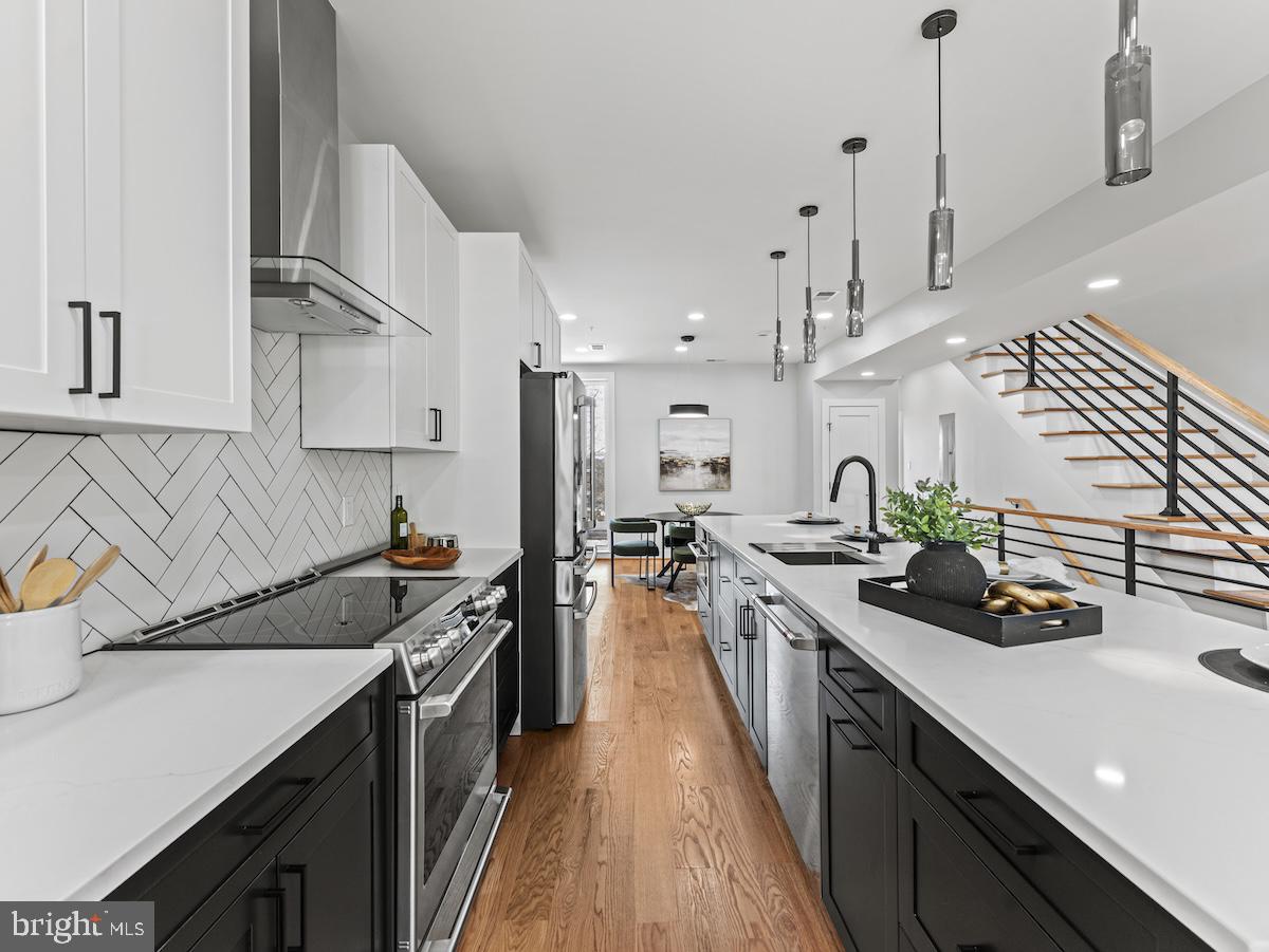 4318 7th Street Northwest, Unit 2 Washington, DC 20011 - Photo 16 of 33 Sleek modern kitchen with elegant finishes.