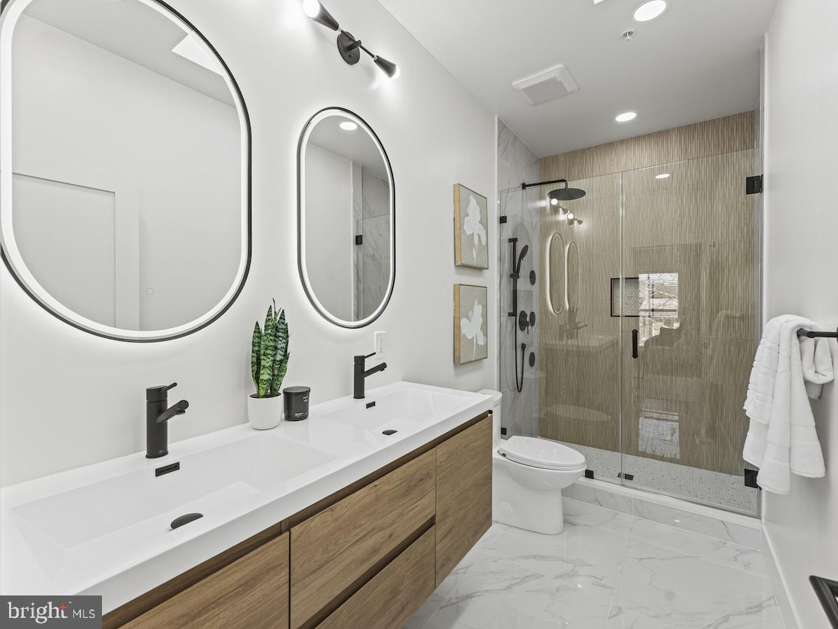 4318 7th Street Northwest, Unit 2 Washington, DC 20011 - Photo 4 of 33 Sleek modern bathroom oasis.
