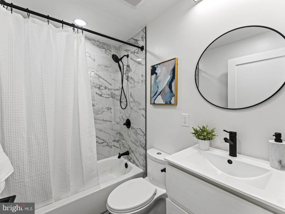 4318 7th Street Northwest, Unit 2 Washington, DC 20011 - Photo 5 of 33 Sleek modern bathroom retreat.