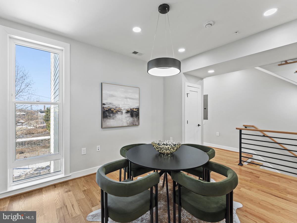 4318 7th Street Northwest, Unit 2 Washington, DC 20011 - Photo 10 of 33 Modern dining space with natural light.