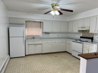 6625 Pershing Road, Unit 3 Stickney, IL 60402 - Photo 4 of 13 a kitchen with appliances cabinets and a sink