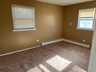 6625 Pershing Road, Unit 3 Stickney, IL 60402 - Photo 7 of 13 an empty room with a window