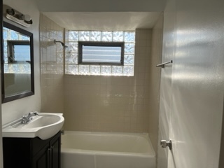 6625 Pershing Road, Unit 3 Stickney, IL 60402 - Photo 8 of 13 a bathroom with a sink and a mirror