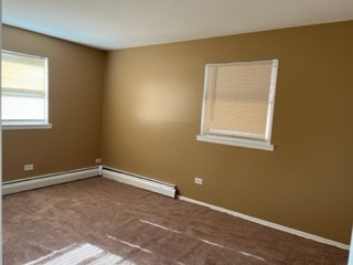 6625 Pershing Road, Unit 3 Stickney, IL 60402 - Photo 9 of 13 an empty room with a window