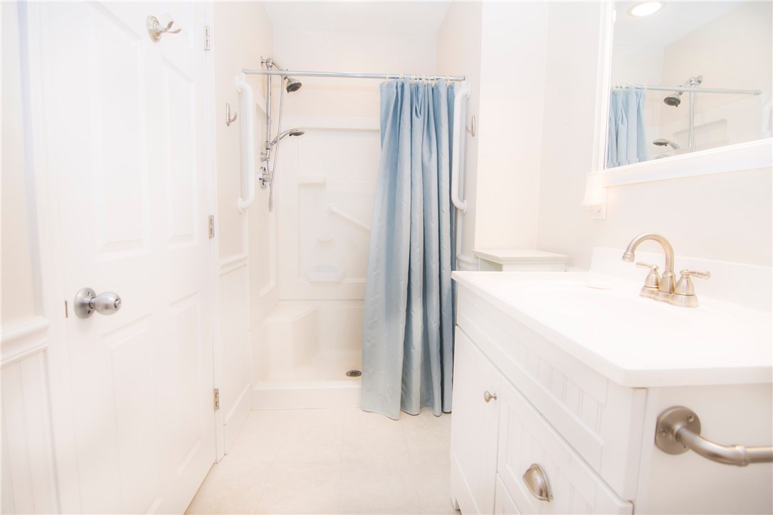 5 Beckside Road North Providence, RI 02911 - Photo 14 of 32 Large and modern first floor bath with walk-in shower.