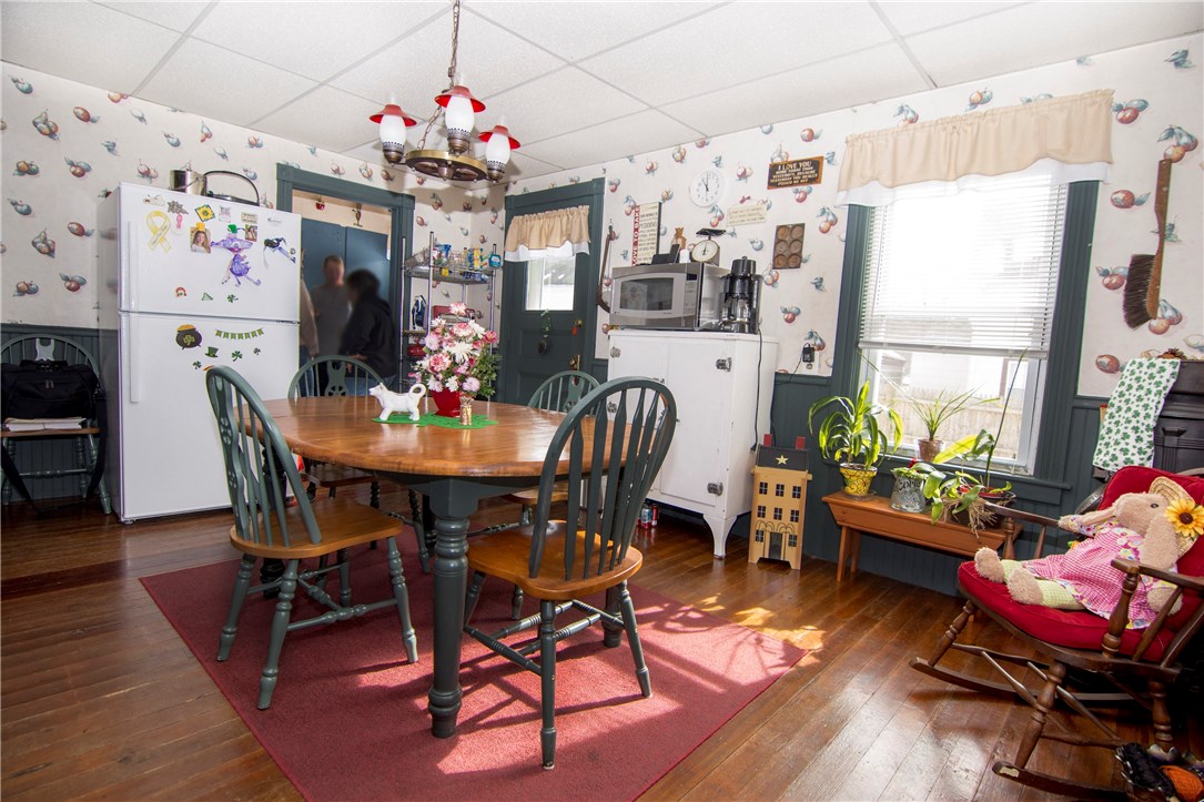 5 Beckside Road North Providence, RI 02911 - Photo 22 of 32 Dining room on tenants side has hardwood flooring and is bright and sunny.