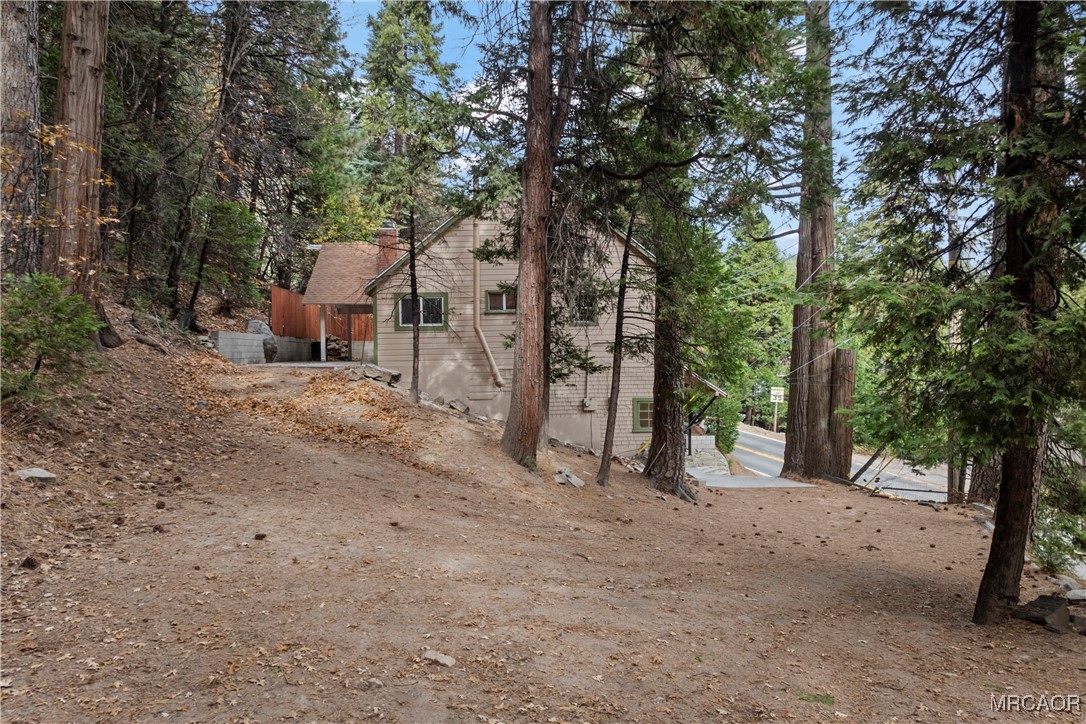 26791 Highway 189 Twin Peaks, CA 92391 - Photo 33 of 39 a view of a covered with trees in the background